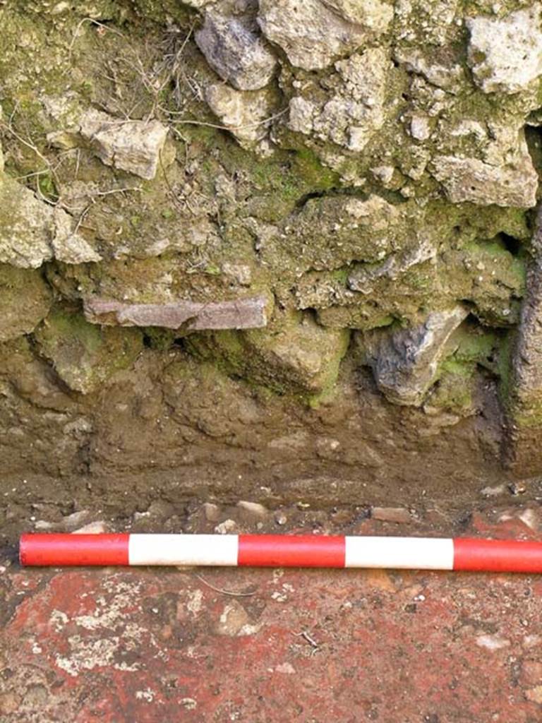 VI.25, Herculaneum. May 2004. Rear room, blocked doorway in west wall.
Photo courtesy of Nicolas Monteix.